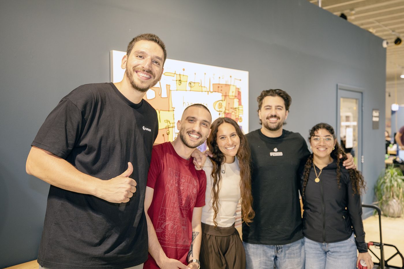 Community members at the Cursor Miami Hackathon