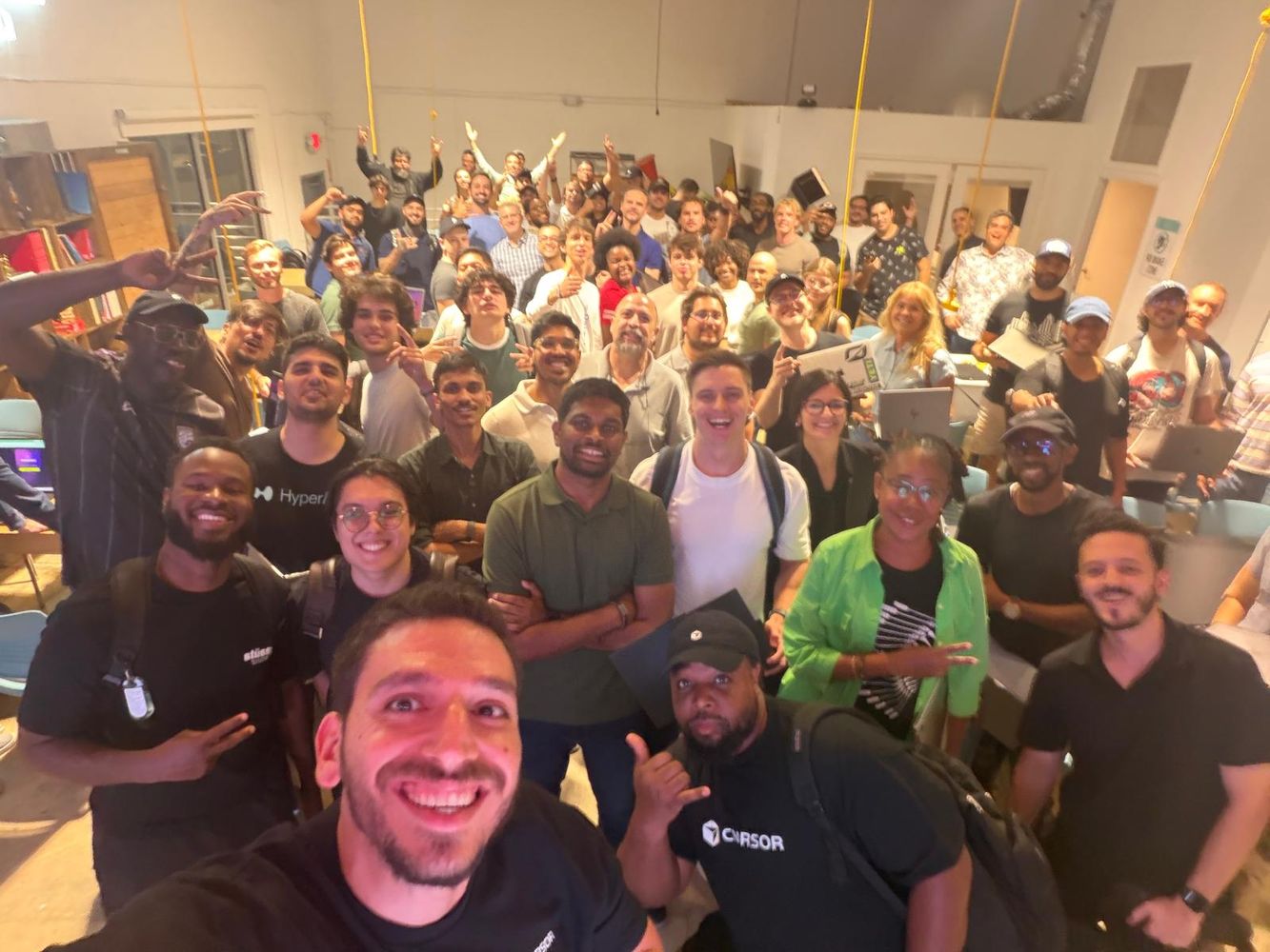 Crowd selfie at the Cursor Miami Hackathon