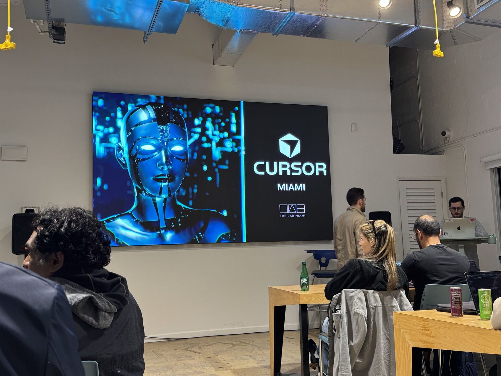 Cursor Miami branding on the LED wall at the February meetup, The LAB Miami